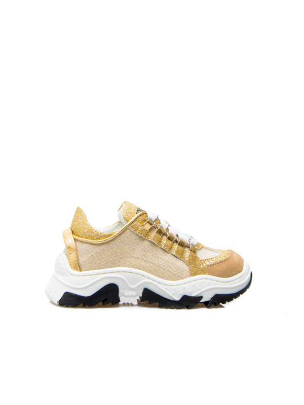 gold colored sneakers