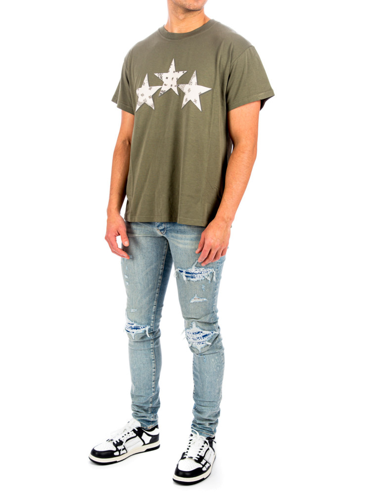 amiri jeans with green stars